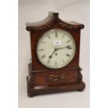 Early Victorian mahogany bracket clock, the shaped case with carved decoration, the circular painted