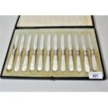 Cased set of twelve silver plated and mother of pearl handled dessert knives with silver collars