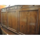 19th Century mahogany side cabinet, the rope pattern moulded top above a central drawer and three