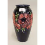 Large Moorcroft Anemone pattern vase with deep blue ground, painted mark WM and impressed marks,