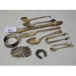 Small quantity of silver flatware, napkin ring, brooch and a decanter label
