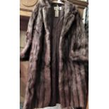 Ladies mid brown full length musquash fur coat, together two mink stoles