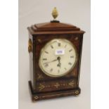 Regency mahogany brass inlaid bracket clock, the circular enamel dial with Roman numerals and single