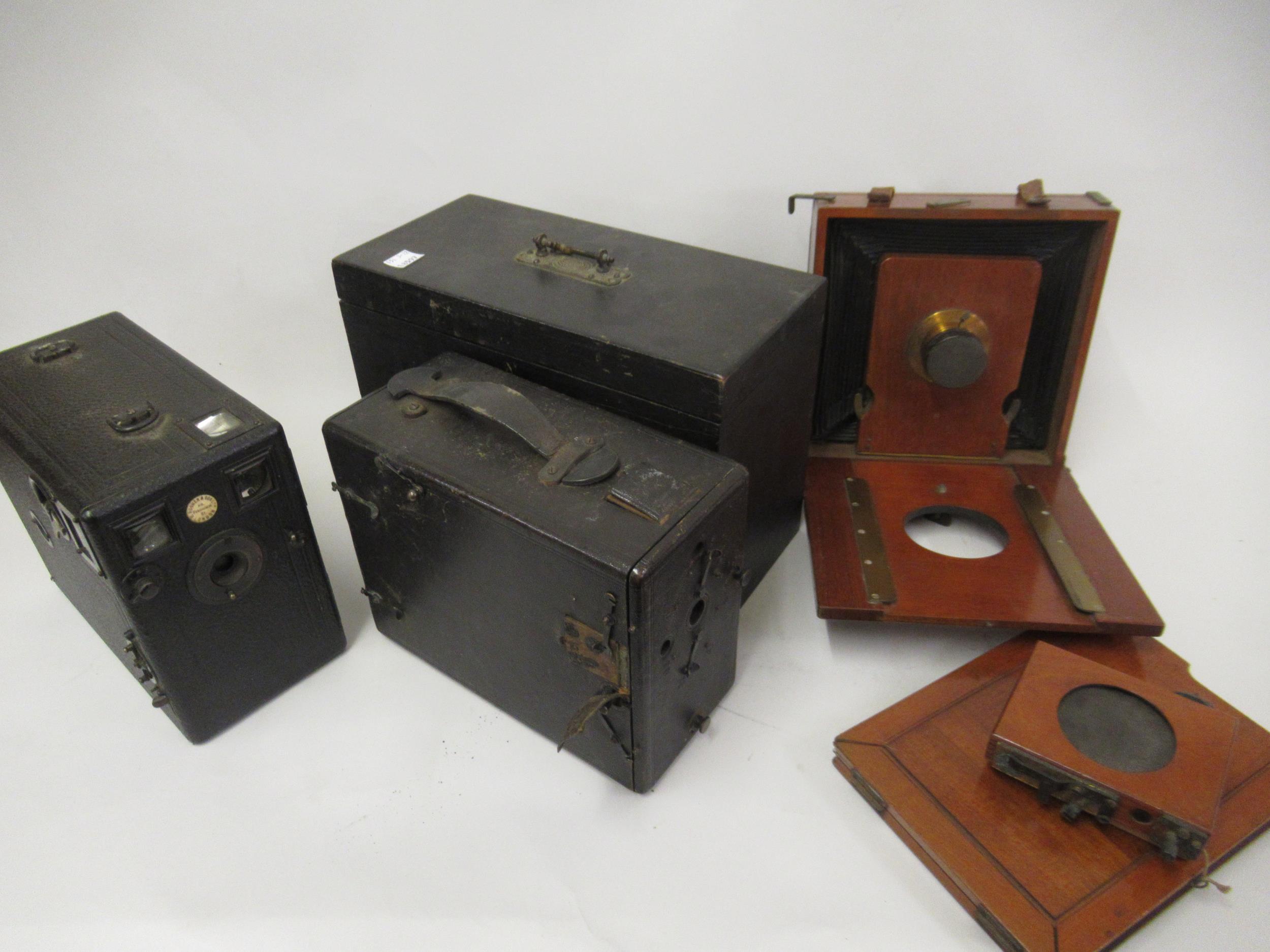 Plate camera and various mahogany plates together with a Hughes & Son box camera