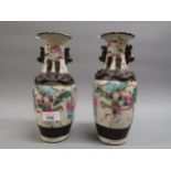 Pair of 19th Century Chinese crackleware baluster form vases, decorated in famille rose colours with