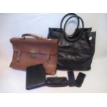 Mid tan leather attache case and a small quantity of other leather bags and purses
