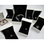 Pandora bracelet with eight various attached charms, together with eight other various Pandora