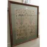 19th Century woolwork pictorial sampler, dated 1885, 22ins x 18ins, framed