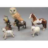 Group of various Beswick animal figures, to include an owl, two sheep and two horses (one sheep at