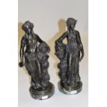 Pair of late 19th Century / early 20th Century patinated bronze figures of classical young maidens