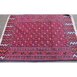 Soumak rug with an all-over stylised design in shades of red and blue with end skirt panels, 4ft