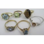 Group of six 9ct gold and gem set dress rings