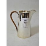 Birmingham silver hot water pot with woven cane handle, makers mark D & H, with presentation