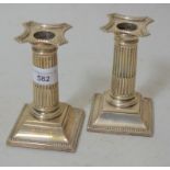 Pair of Birmingham silver dwarf candlesticks in Adam style, 5ins high