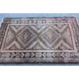 Kurdish rug with a twin hooked medallion design in shades of beige, 6ft x 3ft 8ins approximately