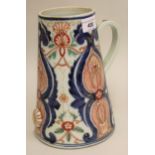 18th / 19th Century Japanese jug of plain tapering form decorated in Imari colours, 8.75ins high