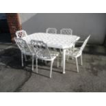 Good quality modern white painted cast alloy garden table with a lattice work top on square tapering
