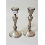 Pair of modern Birmingham silver baluster form candlesticks, 8.25ins high (weighted)