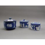 Three various Wedgwood blue Jasperware covered jars (at fault)
