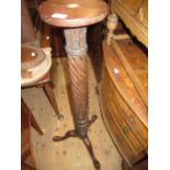 Mahogany turned fluted column torchere on tripod support