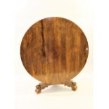 William IV rosewood centre table, the circular tilt top above a turned and tulip carved column