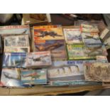 Box containing a quantity of aero model kits by Revell, Matchbox, Italeri, Airfix and others
