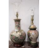 Two modern pottery table lamps in oriental style with hardwood bases