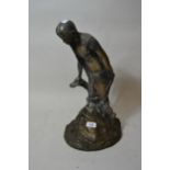 20th Century patinated bronze figure of a girl on a naturalistic base, signed in the bronze A.