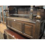 Late 19th / early 20th Century oak hall bench with an arcaded panel back above a three panel box