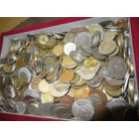 Red box containing quantity of World coins