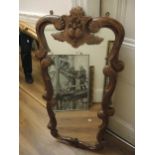 Stained pine C-scroll design hall mirror with carved decoration, 48ins high