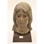 Mid 20th Century bronzed terracotta bust of a lady, unsigned, 12ins high approximately on a square