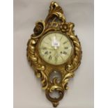 Mid 20th Century carved giltwood Cartel clock case, the painted dial with Arabic and Roman