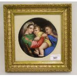 19th Century Continental porcelain plaque depicting the Madonna and child and infant John the