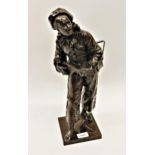 Eutrope Bouret, dark patinated bronze figure of Pierrot playing a mandolin, on a square plinth base,