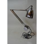 Chromium plated cantilever adjustable table lamp