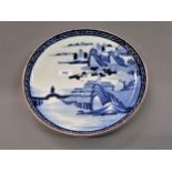 Circular Chinese shallow bowl, painted with a river landscape, 12ins diameter