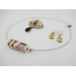 9ct Gold amethyst and pearl set brooch together with a pair of 9ct gold earrings in the form of