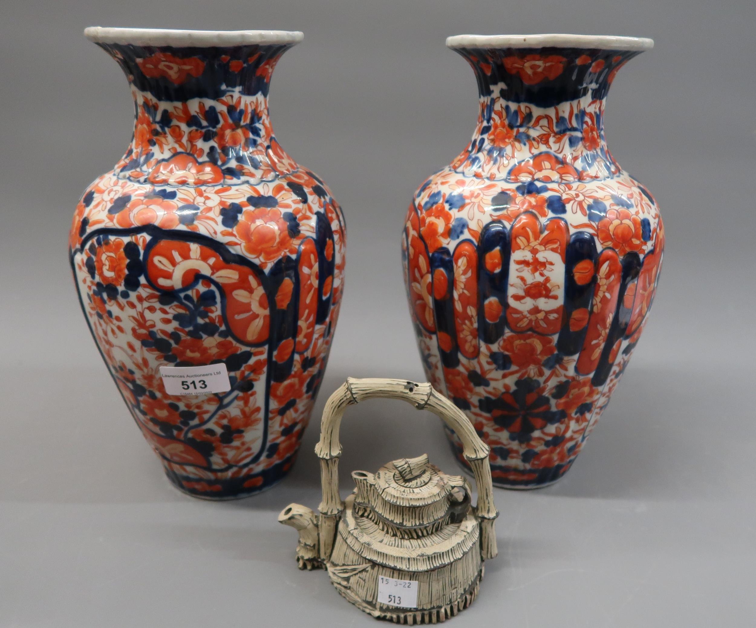 Pair of Imari floral decorated baluster form vases, 12ins high, together with a Chinese terracotta