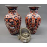 Pair of Imari floral decorated baluster form vases, 12ins high, together with a Chinese terracotta