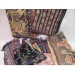 Box containing a quantity of mainly oriental textiles