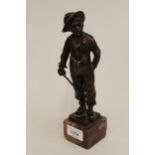 Otto Schmidt-Hofer, small dark patinated bronze figure of a Dutch boy holding a stick, signed in the