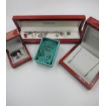 Pair of Tiffany silver earrings in original box and three items of Hot Diamonds jewellery, in