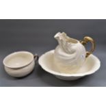 Early 20th Century shell form jug, basin and chamber pot decorated with clear lustre glaze, the