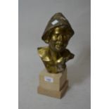 Mid 20th Century gilt bronze bust of boy wearing a hat, a jug and rope over his left shoulder,