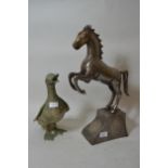 20th Century Persian style niello work figure of a rearing horse, 20ins high together with a brass