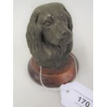 Bronzed composition bust of a King Charles spaniel and five other pieces of metalwork