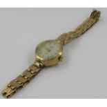 Ladies 9ct gold cased wristwatch on a 9ct gold strap, gross weight 9.5g