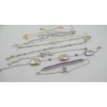 Group of ten various silver bracelets set with various semi precious and gem stones