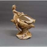 Large Royal Dux centrepiece in the form of a female figure beside a conch shell (damages), 15.5ins